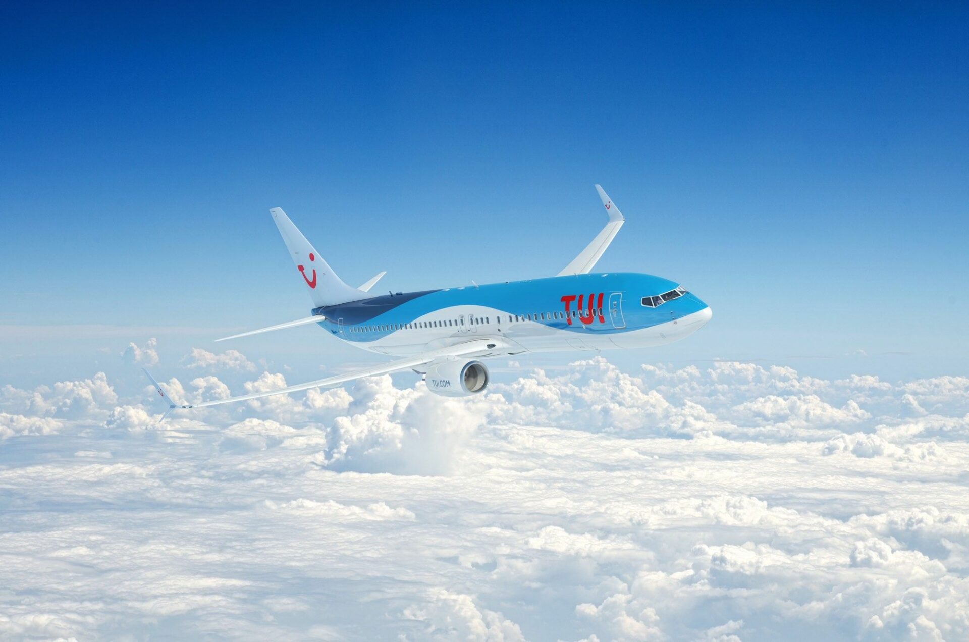 tuifly Flugzeug über den Wolken